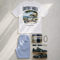 White t-shirt with 'Édition Noble' design, blue striped pants, shoes, and accessories on a light gray surface.